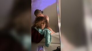 Moaning and rolling her eyes for pleasure